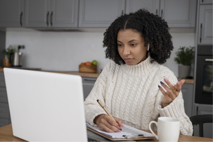 Woman attending telehealth appointment